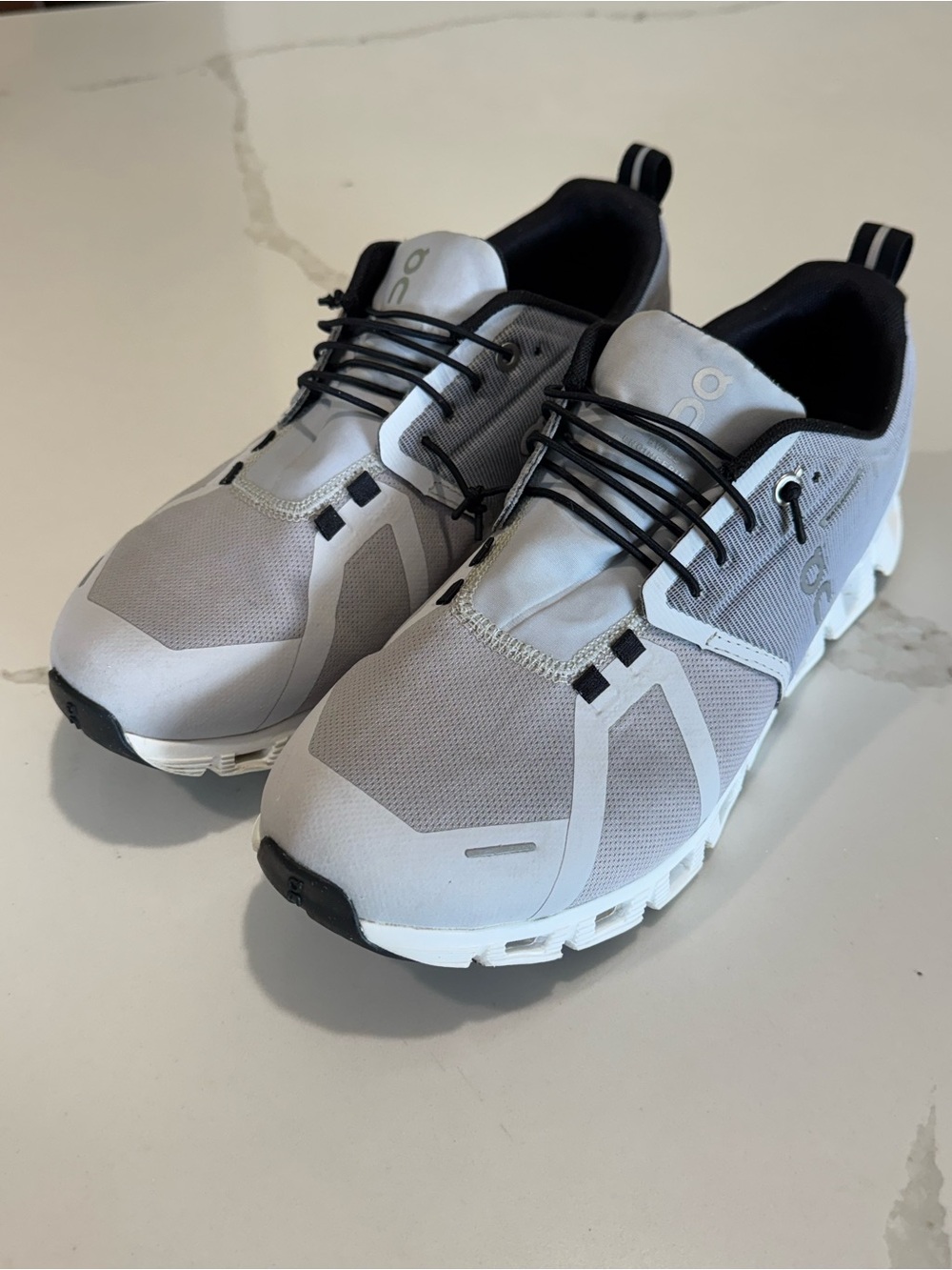 On Running Women’s Light Gray and Black Cloudnova Athletic Sneakers